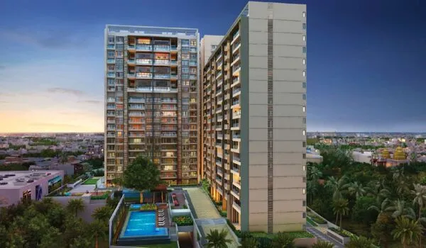 Modern high-rise residential towers and green streetscapes in JP Nagar, South Bangalore
